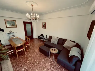 a living room with a couch and a table at Aurelio Vatican Apartment in Rome