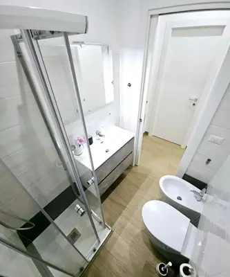 a bathroom with a shower and a toilet and a sink at BFabretti5 in Rome