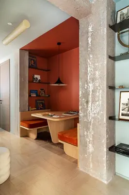 an office with red walls and a wooden desk at ATEL Relais in Rome