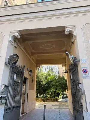 an entrance to a building with two iron gates at Luminosa e accogliente casa Centro Storico in Rome