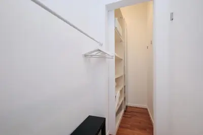 a room with a closet with a stair case at Castel Sant'Angelo - Elegant flat in Rome Centre in Rome