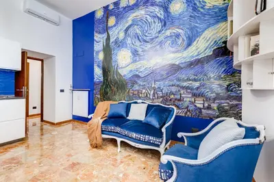 a bedroom with a painting of the starry sky at BDC - Galatea Art Gallery 3BDR at Testaccio in Rome