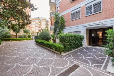 a walkway in front of a building at Rossini Home in Rome