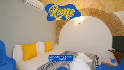 a room with a bed with a sign that says fame at Authentic Central Roman Home - Metro 7min, 5min to Rome Center, AC, Wi-Fi in Rome