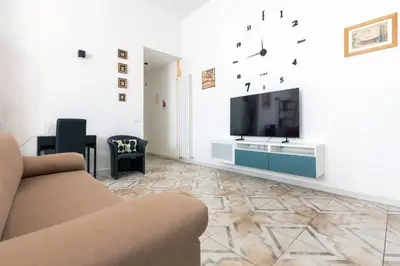 a hallway with a living room and a dining room at Blu Colombo in Rome