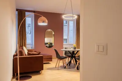a living room with a couch and a table at Pallaro 6 Apartment in Rome