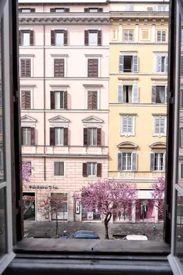 a view of a building from a window at VT Cola di Rienzo Elegant Suites in Rome