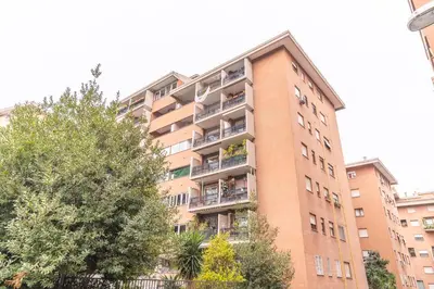 an apartment building with balconies on the side of it at vaticanloft for you in Rome