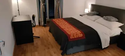 a bedroom with a large bed in a room at B&B Lorenzo 7HillsRoma in Rome