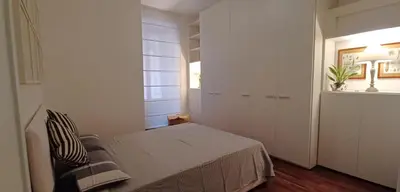 a small bedroom with a bed and a window at Casa Romantica in Rome