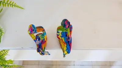 a pair of art pieces hanging on a wall at Casa Maria Teresa by Rentbeat in Rome