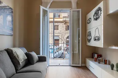 a bathroom with a sink and a toilet and a shower at GuestHost - San Giovanni Laterano Apartment in Rome