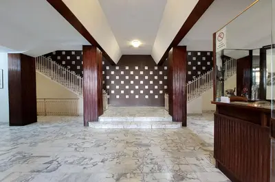 a hallway with a staircase in a house at Manzoni in Rome