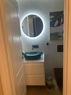 a bathroom with a sink and a mirror at Esquilino rooms in Rome