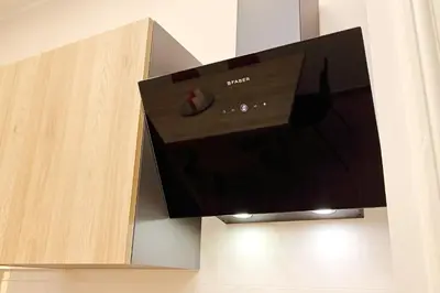 a flat screen tv hanging on a wall at 4BNB - Stylish Spacious Apartment near Vatican in Rome