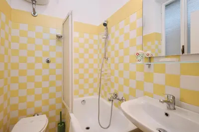 a bathroom with a shower and a toilet and a sink at Penthouse 5 minutes from the Vatican - 5 bedrooms & 4 bathrooms in Rome