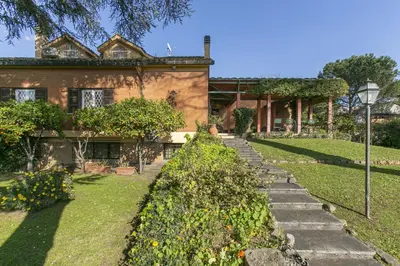 a house with a garden in front of it at Rome Garden Hill in Rome