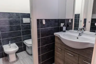 a bathroom with a sink and a toilet at Veturia in Rome