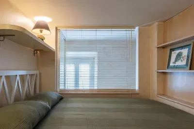 a living room with a large window with a couch at GuestHost - Roma Tiburtina Apartment in Rome