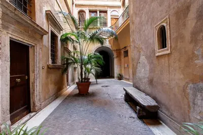 an view of an alley between two buildings at Roma Centro Storico - Palazzo Avila '500 in Rome