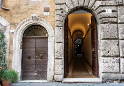 an overhead view of a building with windows and a plant at Roma Centro Storico - Palazzo Avila '500 in Rome