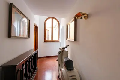 a living room with a couch and a table at Roma Centro Storico - Palazzo Avila '500 in Rome