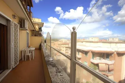 a balcony with a view of a city at Manuela Holiday House in Rome