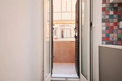 a mirror in a bathroom with a shower at Termini Station 5 minutes - Free Wi-Fi & Netflix in Rome