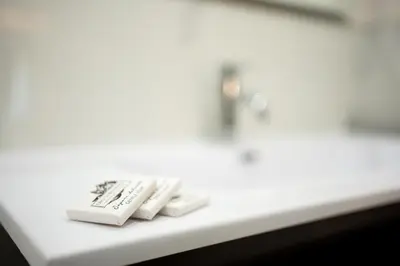 two remote controls sitting on top of a counter at C&P Luxury Guest House Rome in Rome