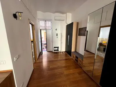a small bedroom with a bed and a window at Nel cuore di San Lorenzo in Rome