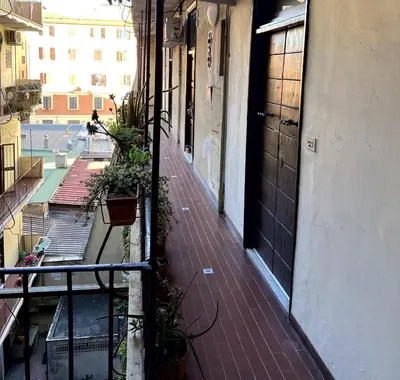 a bathroom with a shower and a sink and a toilet at Nel cuore di San Lorenzo in Rome