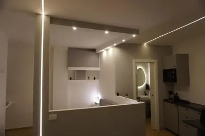 a bathroom with a sink and a mirror in a room at Tito Livio Vatican Home in Rome