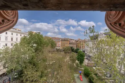 a view of a city with buildings and trees at Dante Secret Home in Rome