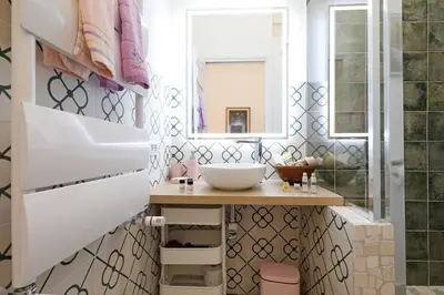 a bathroom with a sink and a mirror at Walking in the center of Rome in Rome