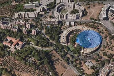 an overhead view of a city with a swimming pool at Super attico Eur in Rome