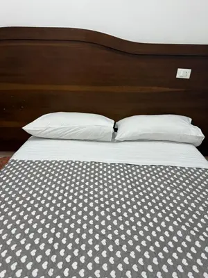 a bedroom with a bed and a checkered floor at GranRoma in Rome