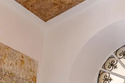 a room with a white wall and a ceiling at iFlat New Boutique Apartment in Rome's Heart in Rome
