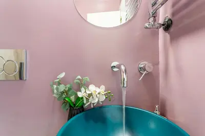 a bathroom sink with a faucet and a mirror at iFlat New Boutique Apartment in Rome's Heart in Rome