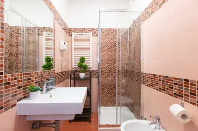 a bathroom with a sink and a shower at Rental in Rome Guest House - ZEN01 in Rome