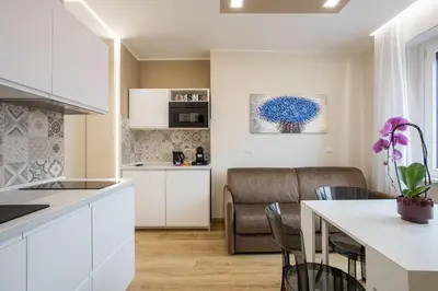 a living room with a couch and a table at Aurelius Design Loft 1 in Rome