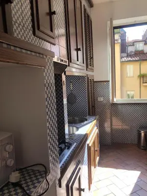 an open window with a view of a building at Borgo in Elegante appartamento in Rome
