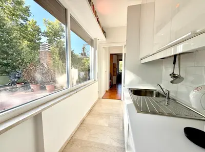 a kitchen with a sink and a window at Bauhouse in Rome