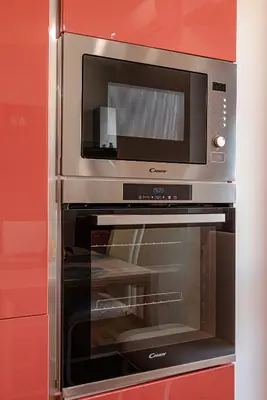 a microwave oven sitting inside of a kitchen at San Giovanni Al Colosseo in Rome