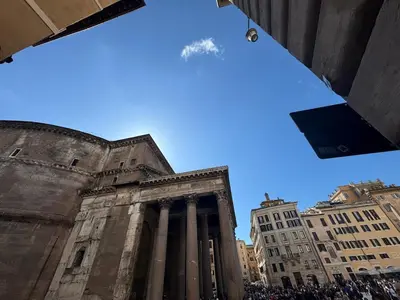 a group of people standing in front of a building at New! Renovated Apt in Ancient Rome in Rome