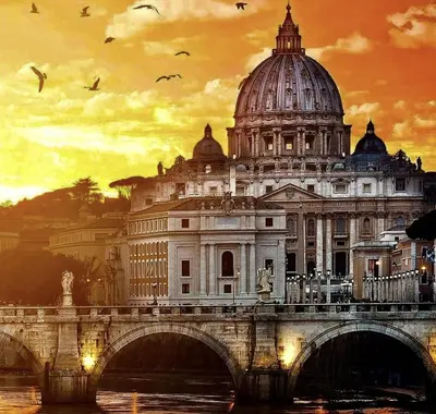 a building with a bridge in front of a building at Borghese Luxury Loft - LIBERTY COLLECTION in Rome