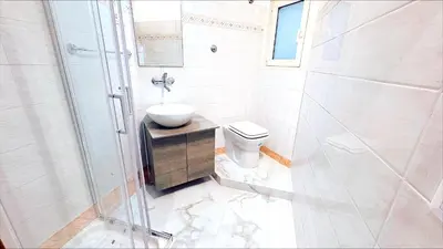 a bathroom with a toilet and a sink and a shower at Domus Remo Room #2 in Rome