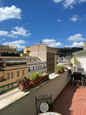 a view of a balcony with potted plants on it at Casa del Grillo in Rome
