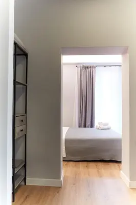 a bedroom with a bed and a window at RipettArt Apt in Rome
