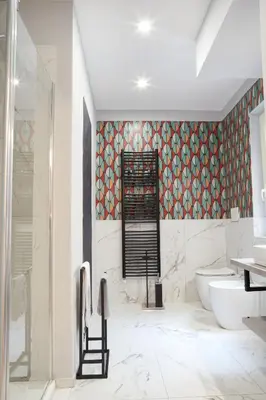a bathroom with a shower and a toilet and a sink at RipettArt Apt in Rome