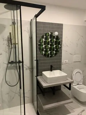 a bathroom with a sink and a toilet at RipettArt Apt in Rome